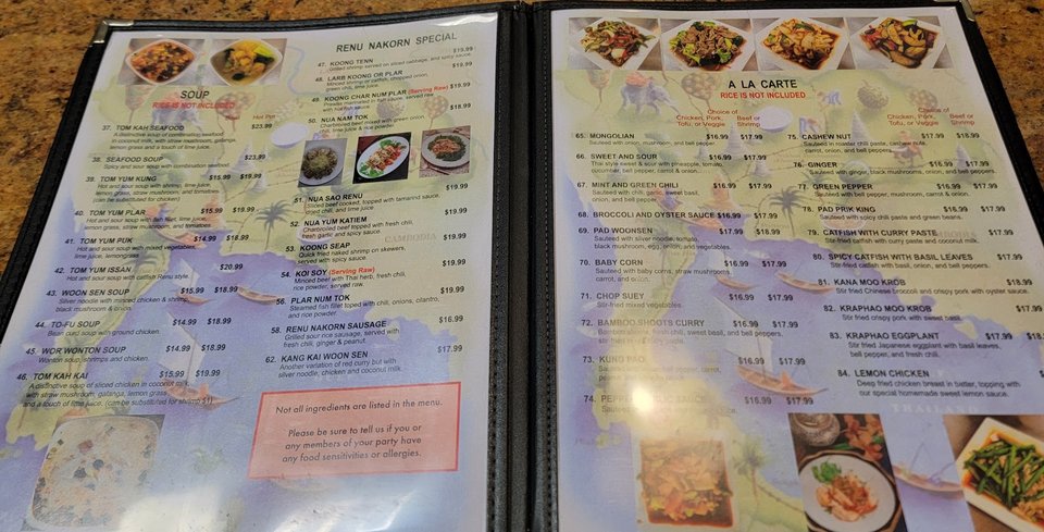 Warm interior with seating for dine-in meals.