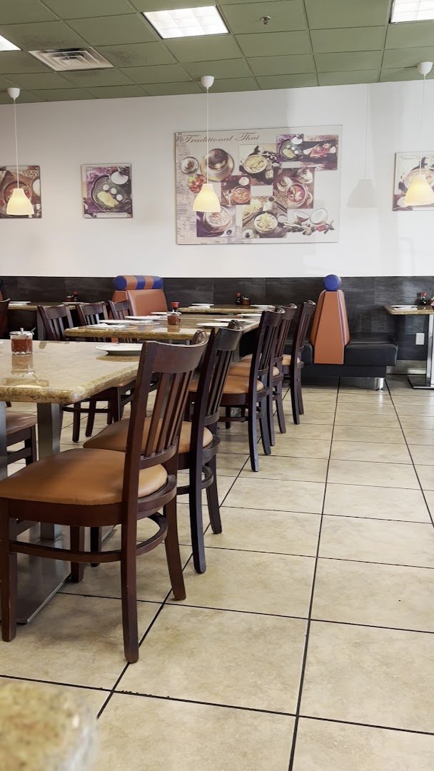 Thai dishes on a casual restaurant table.
