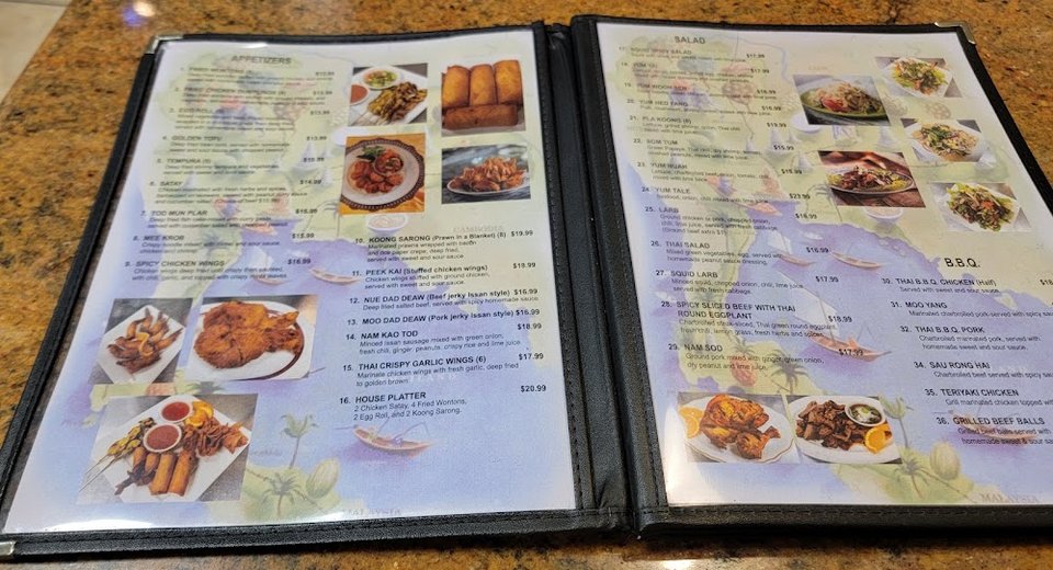 Menu page with Thai appetizers and soups.